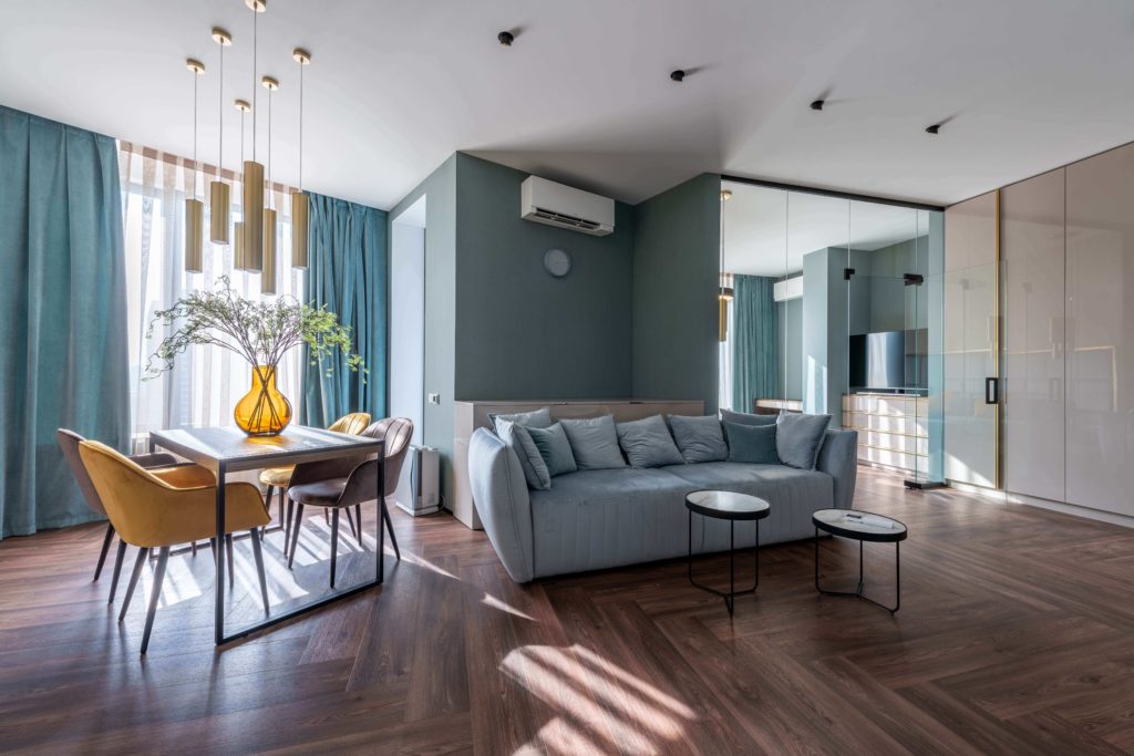 A clean modern living room with a ductless unit.